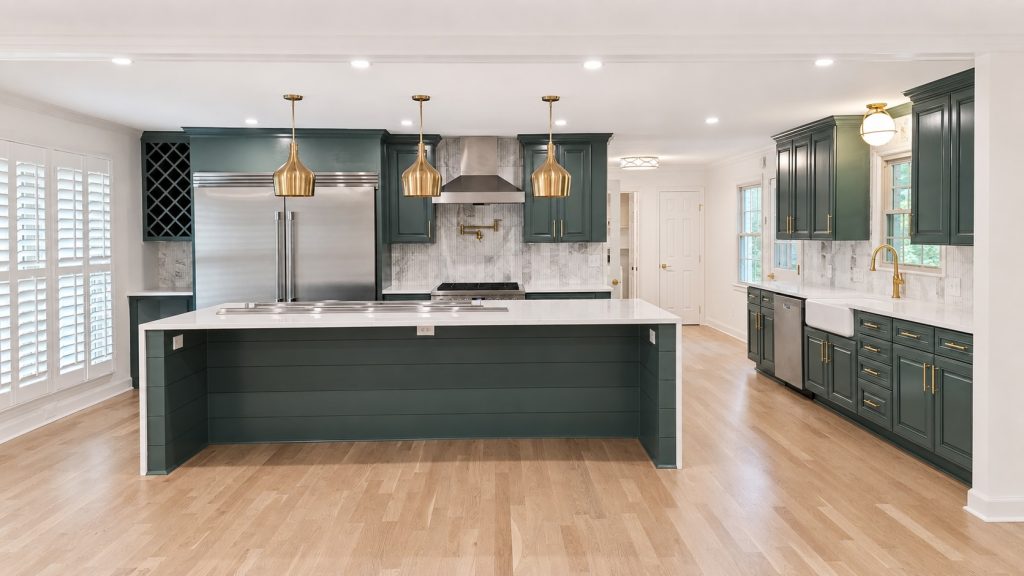 Polished green kitchen with brass pendants