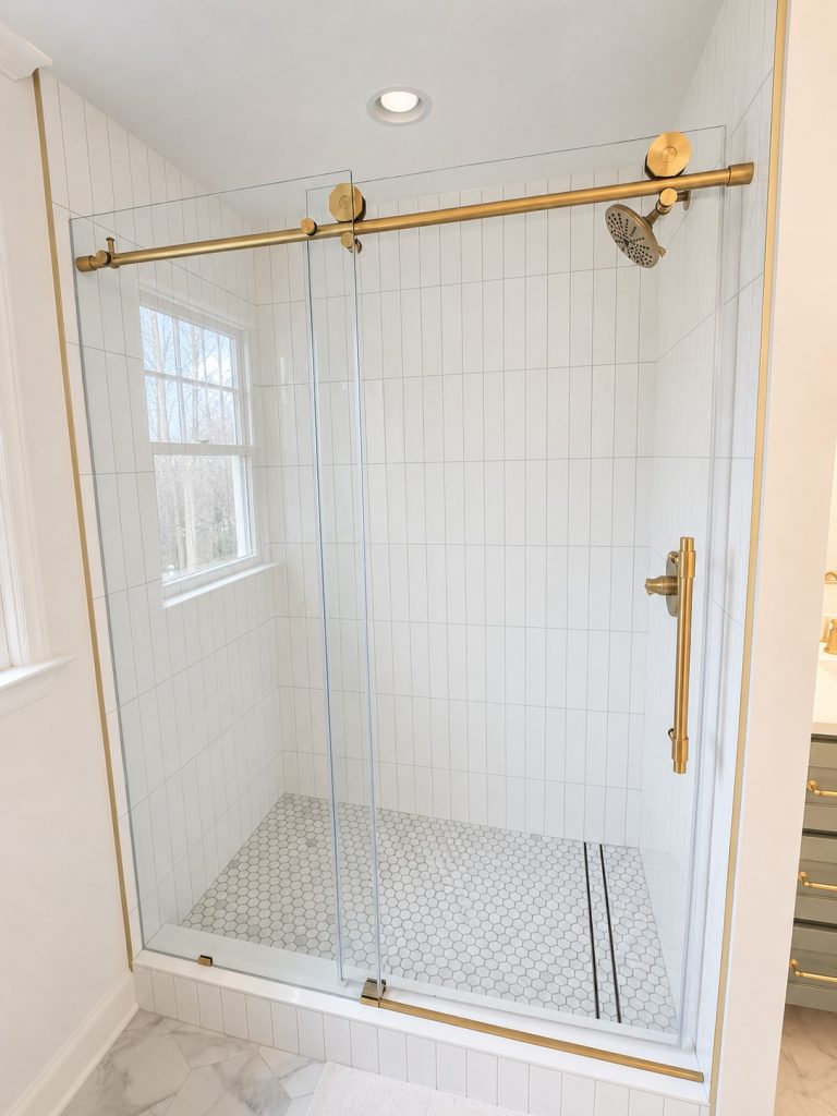 Refined brass framed glass shower