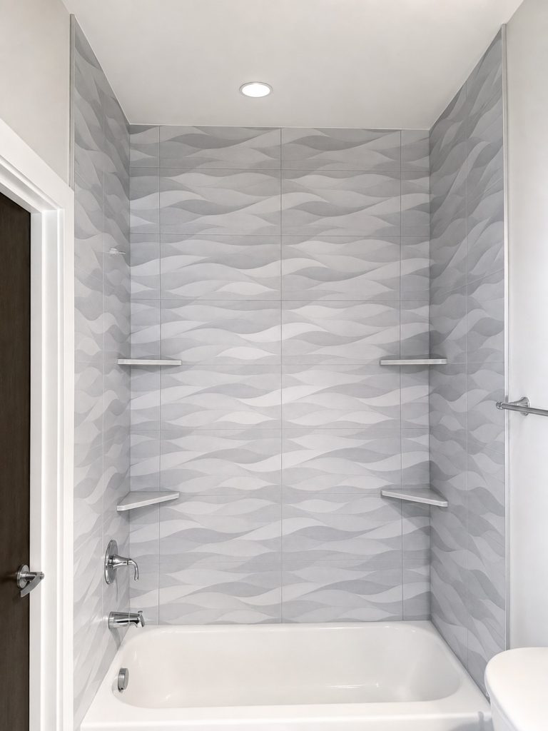Refined gray and white tub alcove